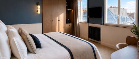 Deluxe Room, City View | Premium bedding, in-room safe, desk, laptop workspace