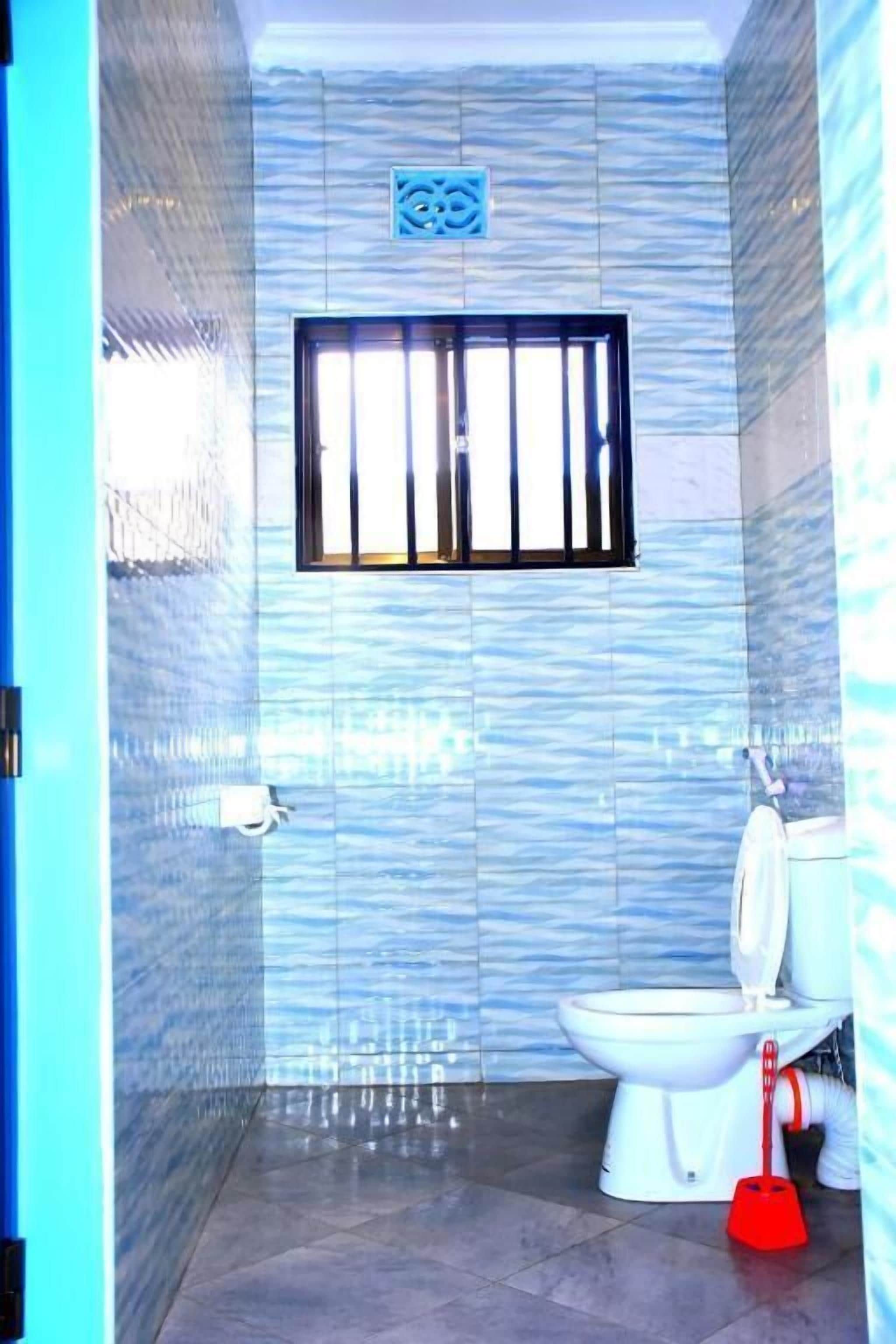 Habitación Deluxe doble, vistas a la ciudad | Baño | Zapatillas