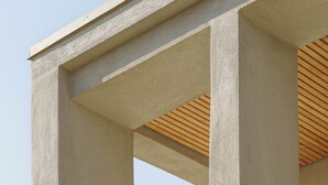A modern building with a stone base, concrete columns, and a wooden slatted roof. - A quiet home, between Provence and the Calanques (Simiane-Collongue)