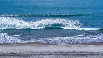 On the beach, sun-loungers, beach towels