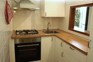 Private kitchen - Three-room countryside apartment (Orbetello)