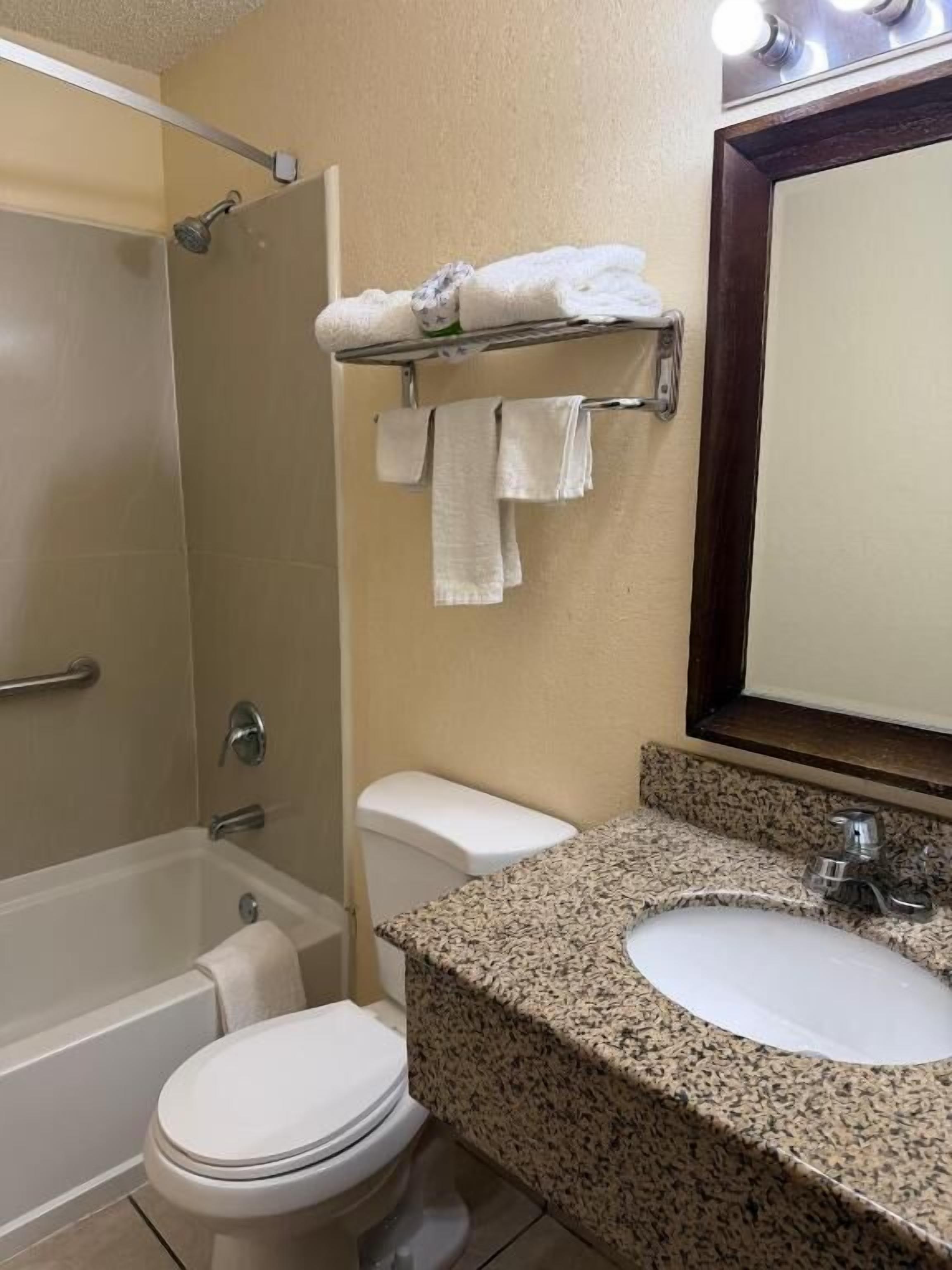 Combined shower/bathtub, hair dryer, towels, soap