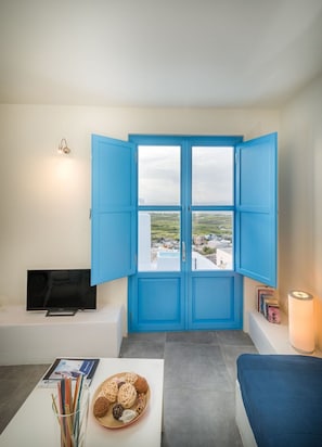 TV, DVD player, music library, stereo - Superb Santorini Suites | Finikia Honeymoon Suite with Outdoor Private Jacuzzi (Oia)
