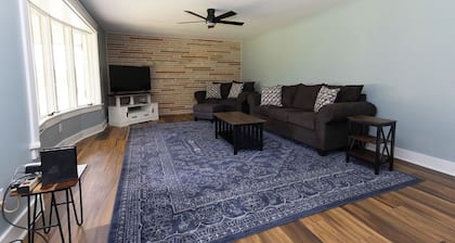 Newly Renovated 3-bedroom farmhouse with AC on 15 acres in delightful Louisville