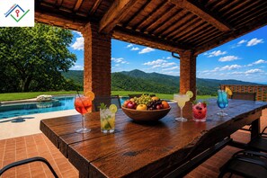 Outdoor dining - La Casina: Tuscan Villa with Pool, Spa & Views (Riparbella)
