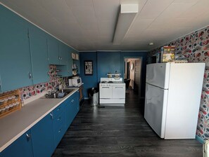 Private kitchen - Charming East facing view of lake and city! Close to beaches,kiddies spray pool (Flin Flon)