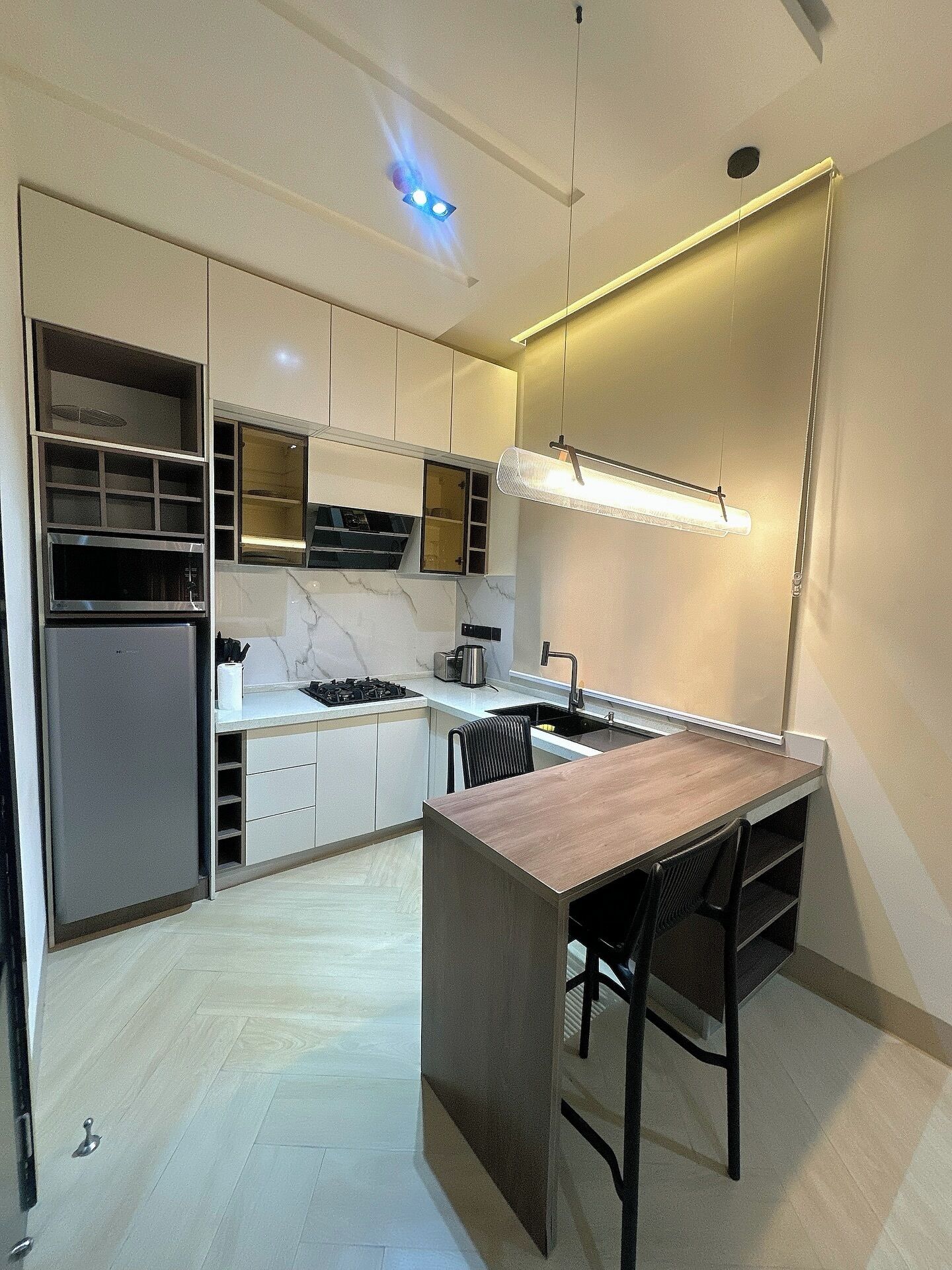 Apartamento família, sacada, vista para a cidade | Cozinha privada