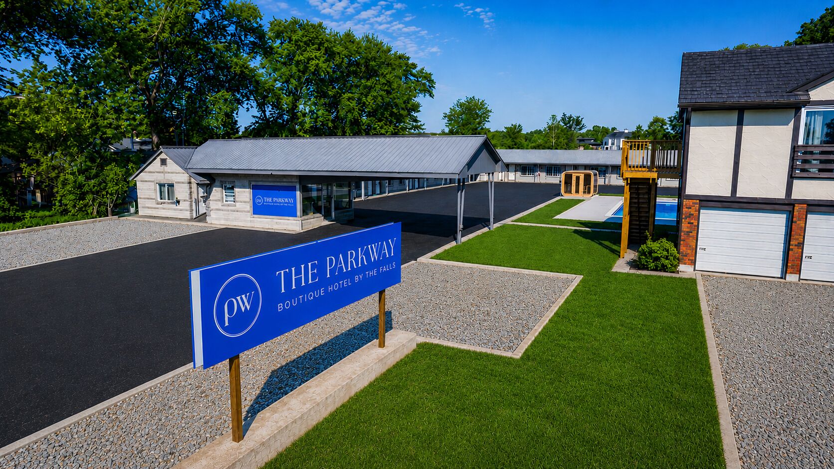 A hotel entrance with a sign reading 'The Parkway Boutique Hotel by the Falls.'