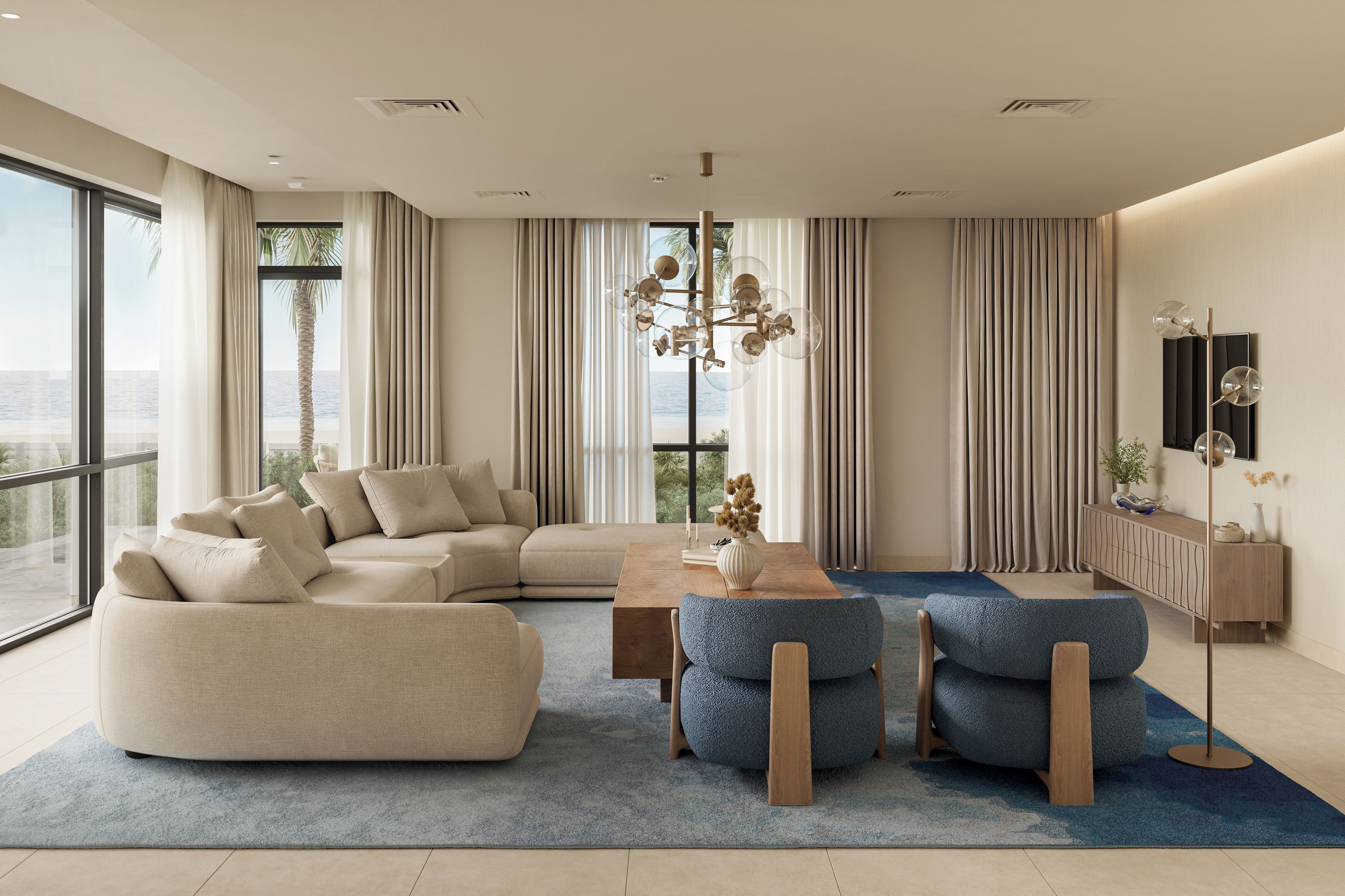 A modern living room with a sectional sofa, a coffee table, and a blue accent chair.