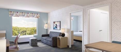A hotel room with a bed, a desk, a chair, a sofa, a lamp, and a window with a view of trees.