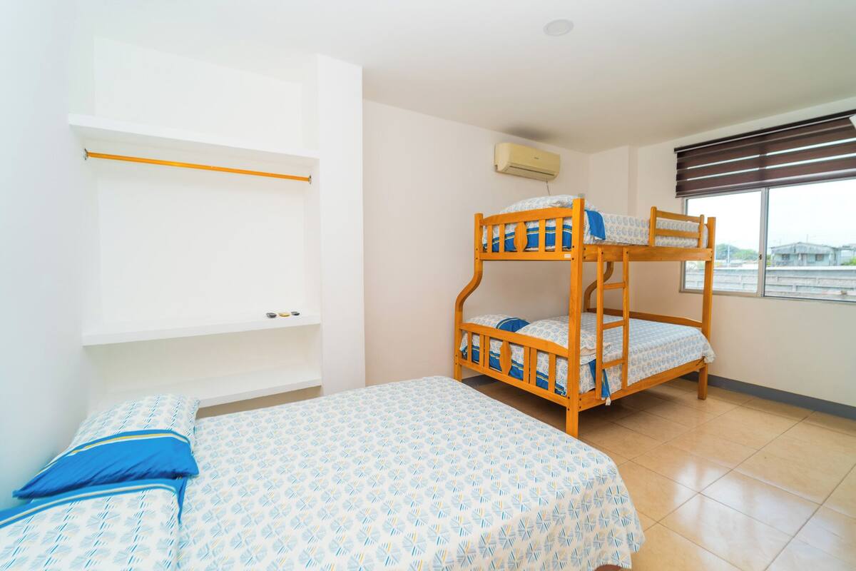 Family Quadruple Room, Air conditioning, City View | Laptop workspace, blackout drapes, iron/ironing board (on request)