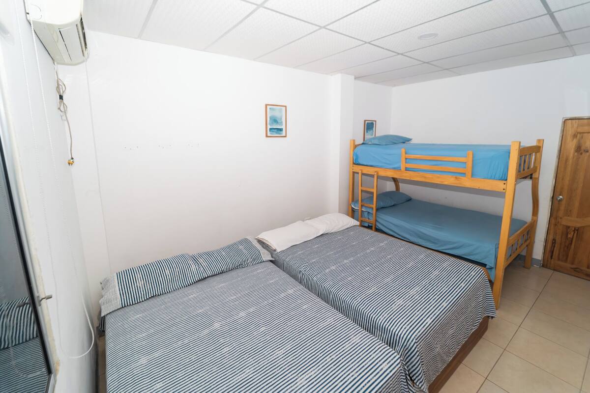 Family Quadruple Room, Private Bathroom, City View | Laptop workspace, blackout drapes, iron/ironing board (on request)