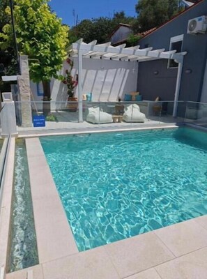 Outdoor pool, a heated pool - Astre King Suite with Infinity heated Pool (Sozopoli)