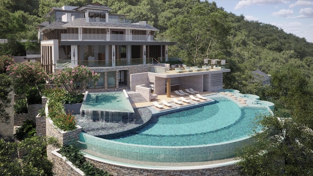 Una casa moderna con piscina, una cascada y un área de terraza.