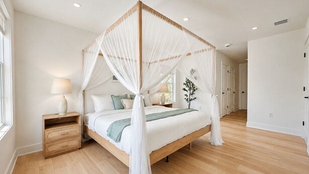 A four-poster bed with a canopy, bedside tables, a nightstand, and a bedside lamp. - Brand New 2026 Villa, 5 min Walk to the Beach, King Canopy Suite, Sleeps 16 (Keansburg)