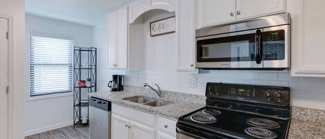 Coffee/tea maker, fridge, microwave, oven