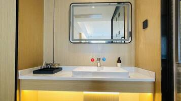 Luxury Suite, City View | Bathroom | Shower, hair dryer, towels, soap