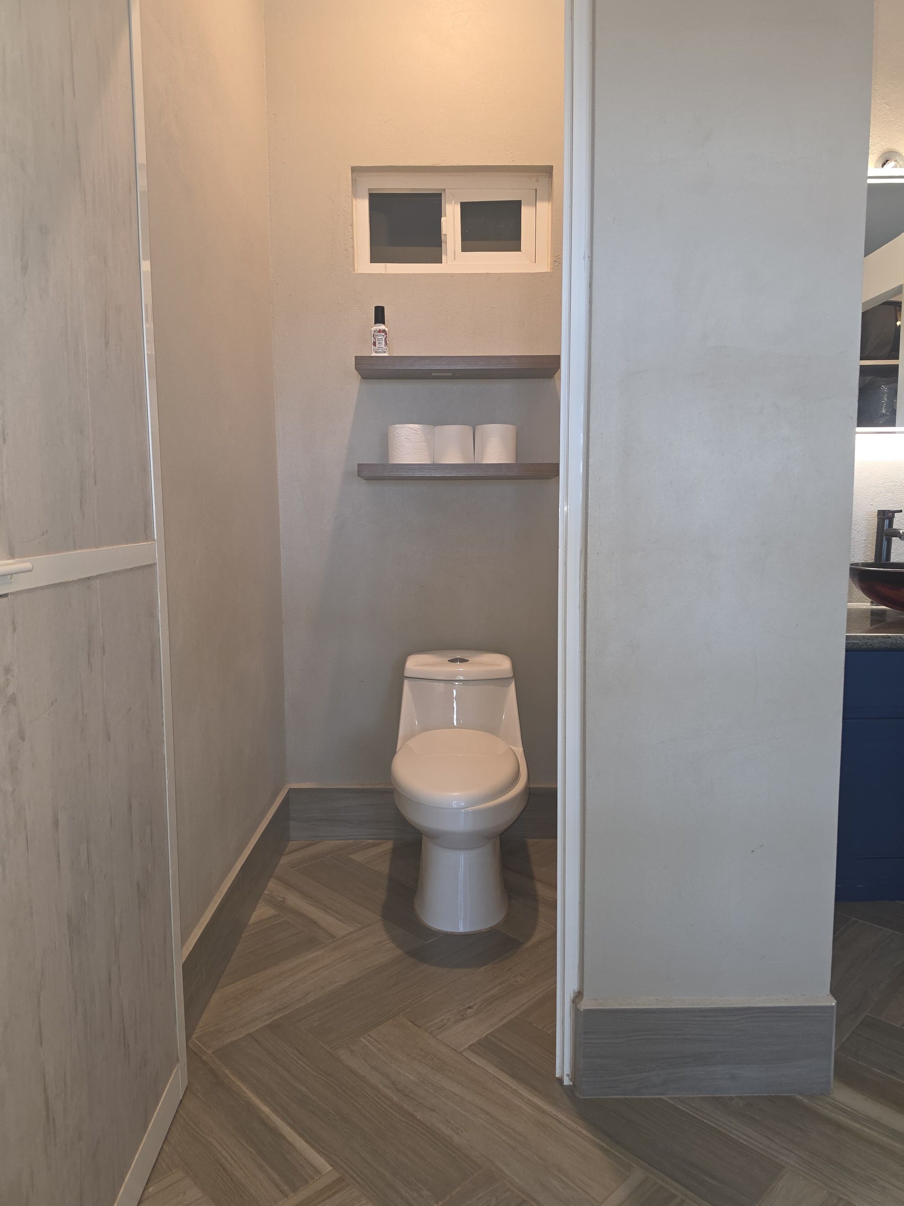Shower, hair dryer, towels, toilet paper
