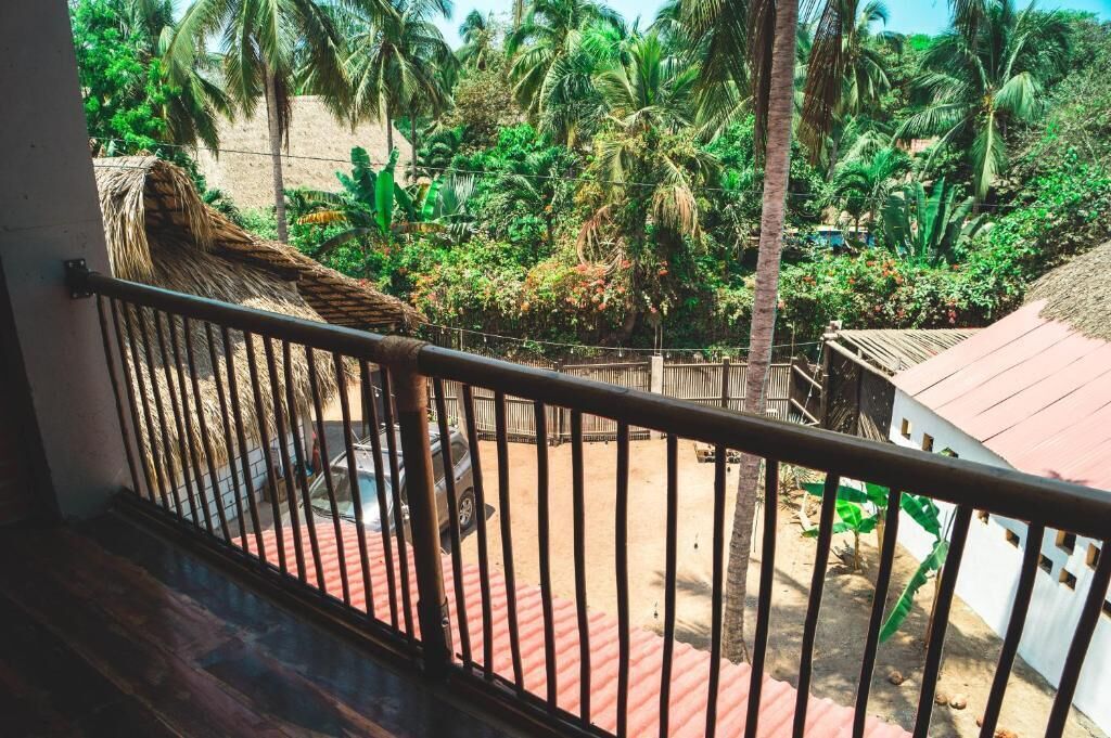 Deluxe Suite, Balcony, Courtyard View | Property grounds