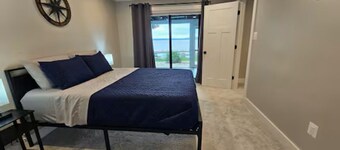 Resort style house on the river with dock,Fishing, boating, salt water pool!