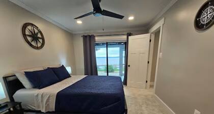Resort style house on the river with dock,Fishing, boating, salt water pool!