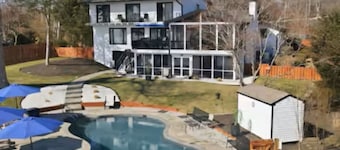 Resort style house on the river with dock,Fishing, boating, salt water pool!