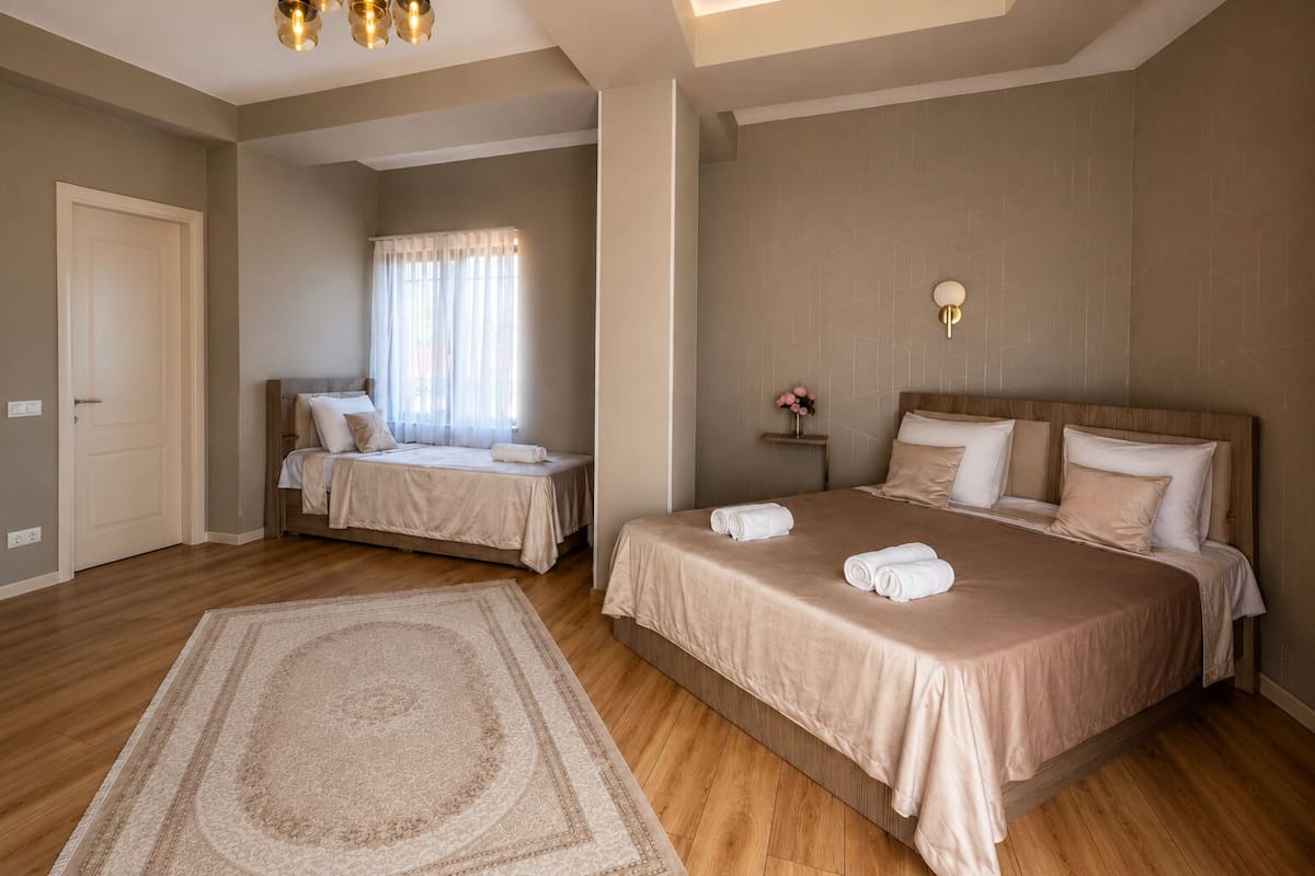 Deluxe-Dreibettzimmer, Gartenblick