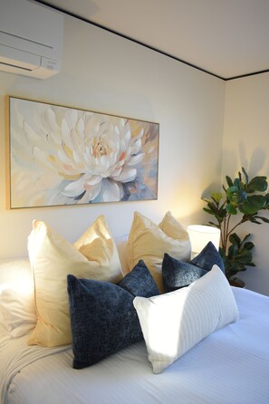2 dormitorios, tabla de planchar con plancha, wifi gratis y ropa de cama