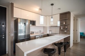 Familienapartment, Balkon, Stadtblick | Eigene Küche