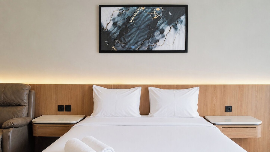 Restful Combined 2Br At Apartment Tamansari Skylounge Balikpapan