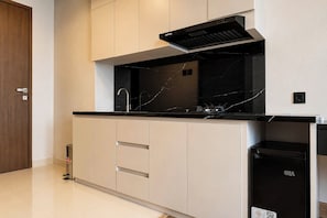 Standard Apartment | Private kitchen - Spacious 1Br Combined Unit At Apartment Tamansari Skylounge Balikpapan (Balikpapan)