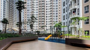 Children's play area - outdoor - Warm Stylish Studio Apartment Tokyo Riverside Pik 2 (Jakarta)