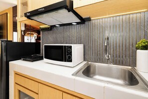 Standard Studio | Private kitchen - Warm Stylish Studio Apartment Tokyo Riverside Pik 2 (Jakarta)