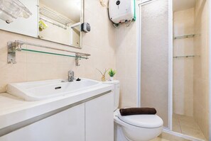 Standard Apartment | Bathroom - Compact With Minimalist Design 2Br At Springlake Summarecon Bekasi Apartment (Bekasi)