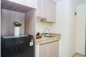 Standard Apartment | Private kitchen - Bright Nice 2Br At Apartment Meikarta District 1 (Cikarang)