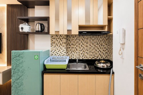 Functional With Minimalist Design 2Br At Vida View Makassar Apartment