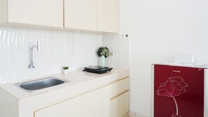 Standard Studio | Private kitchen - Comfortable Living Studio At Apartment Sentul Tower (Bogor)