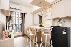 Unclassified image, 4 of 21, button - Warm And Homey 2Br Apartment Podomoro Golf View (Depok)