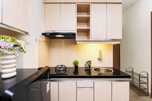 Unclassified image, 5 of 21, button - Warm And Homey 2Br Apartment Podomoro Golf View (Depok)