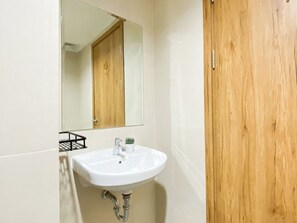 Standard Studio | Bathroom - Good Neat Studio Room At Apartment Lrt City Jatibening (Bekasi)