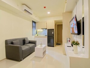 Standard Apartment | Living room - Urban Comfort 2Br At Apartment Meikarta District 2 (Cikarang)