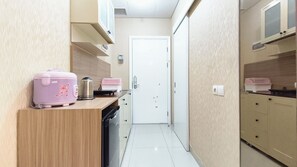 Standard Studio | Private kitchen - Modern Look Studio At Apartment The Vertu (Surabaya)