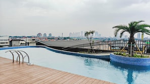 Outdoor pool - Best Choice Studio Apartment At Westown View Surabaya (Surabaya)