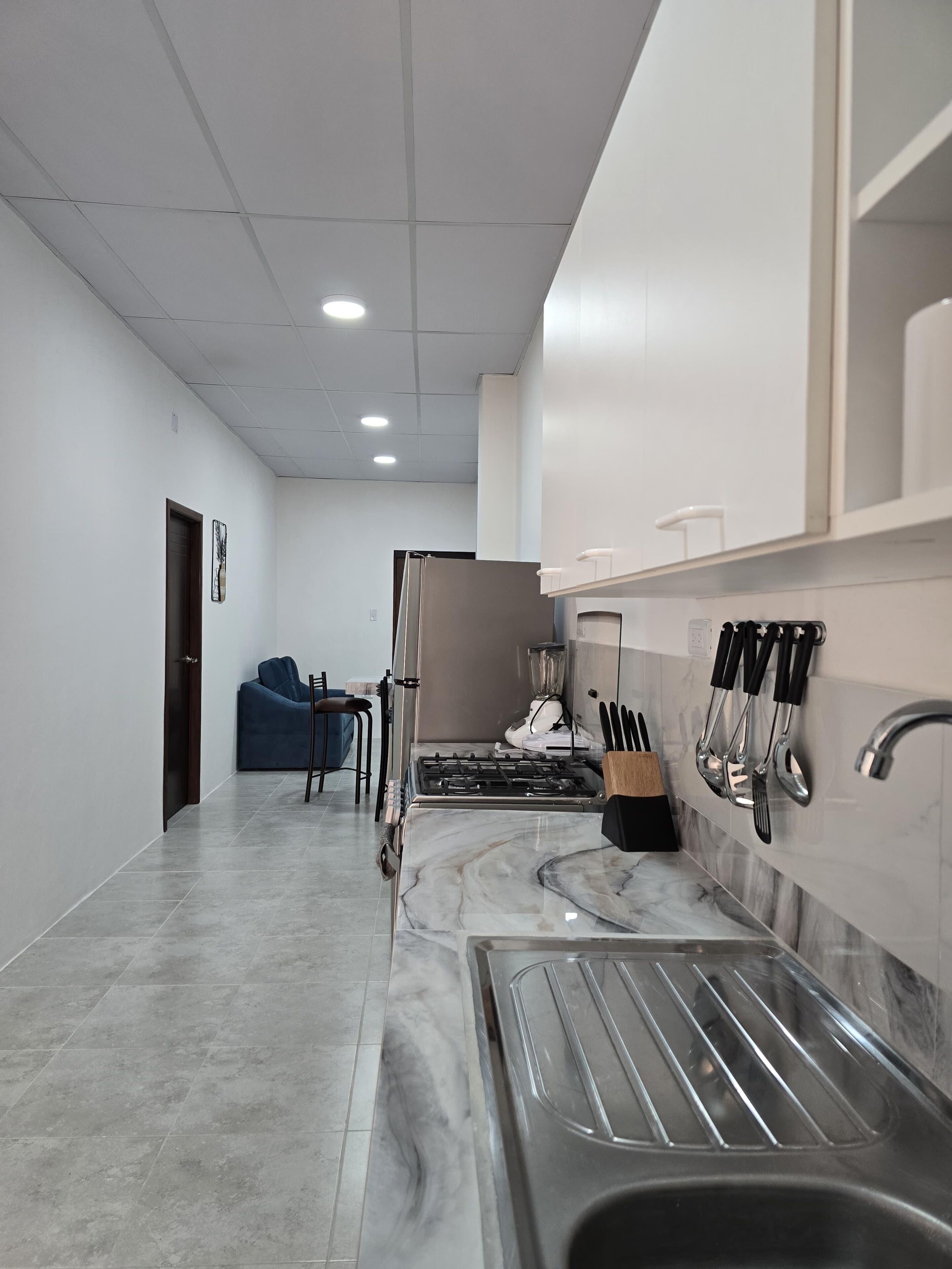 Fridge, oven, coffee/tea maker, toaster