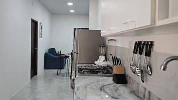Fridge, oven, coffee/tea maker, toaster