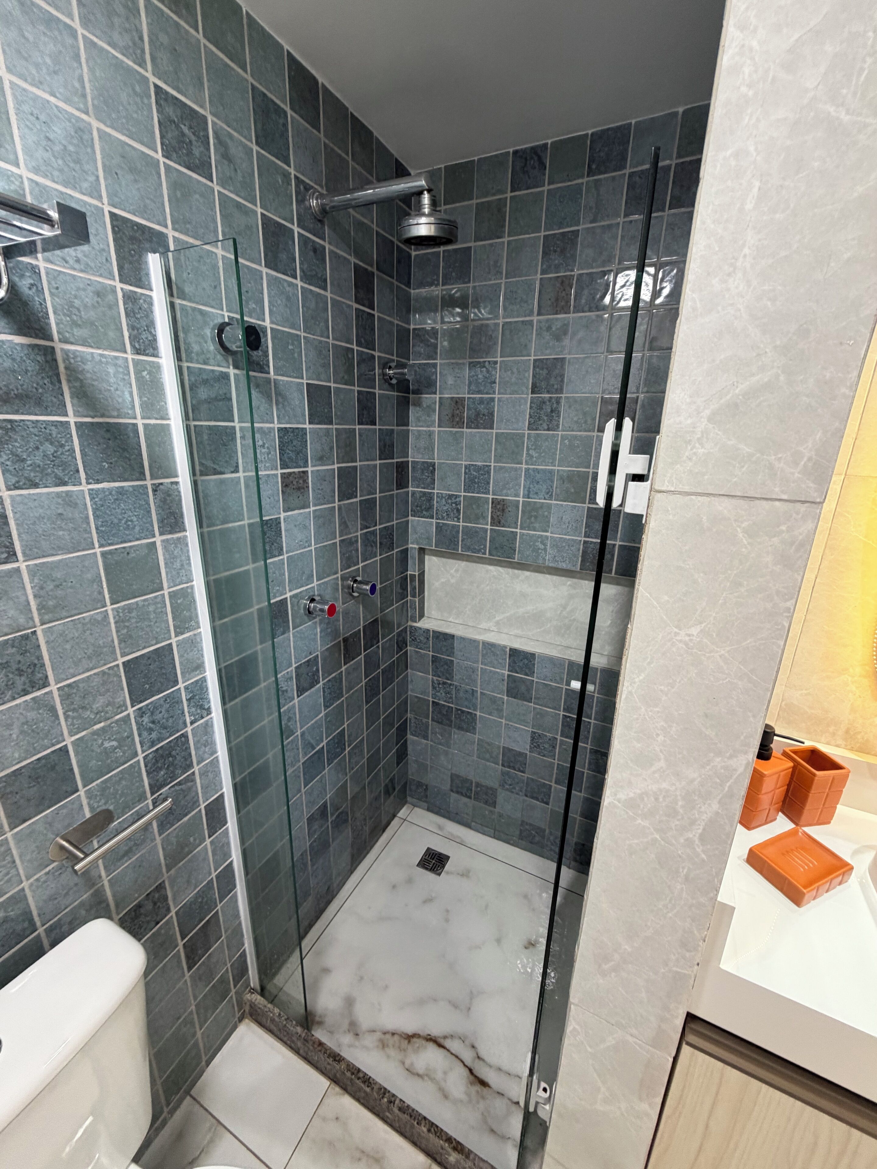Shower, towels, soap, shampoo