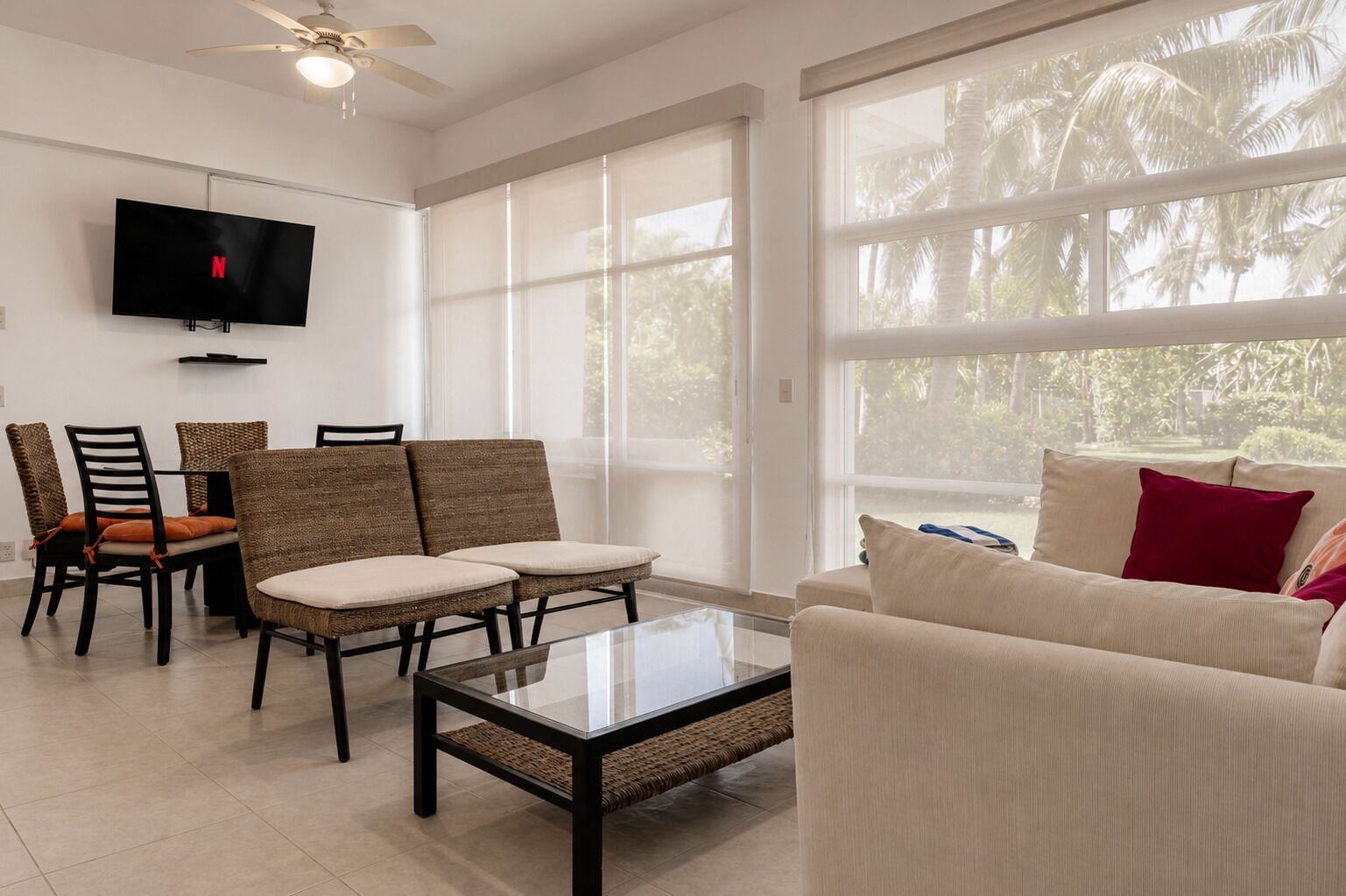 Departamento Deluxe, vista al jardín | Área de sala de estar