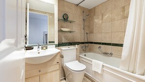A bathroom with a sink, toilet, bathtub, and shower. - Penthouse With Terrace on Maida Vale Border (London)