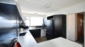 Coffee/tea maker, fridge, microwave, oven