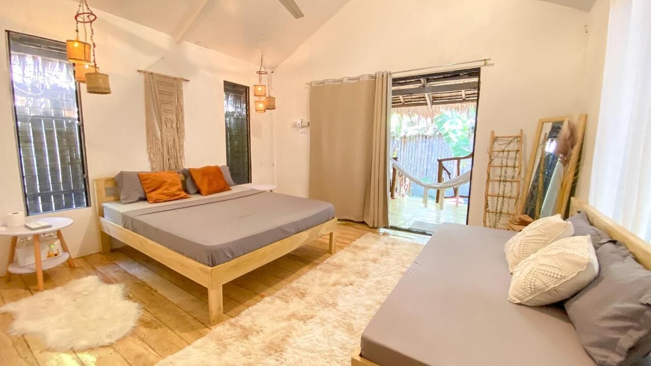 Bungalow, ban công, quang cảnh vườn | Két bảo mật tại phòng, màn/rèm cản sáng 